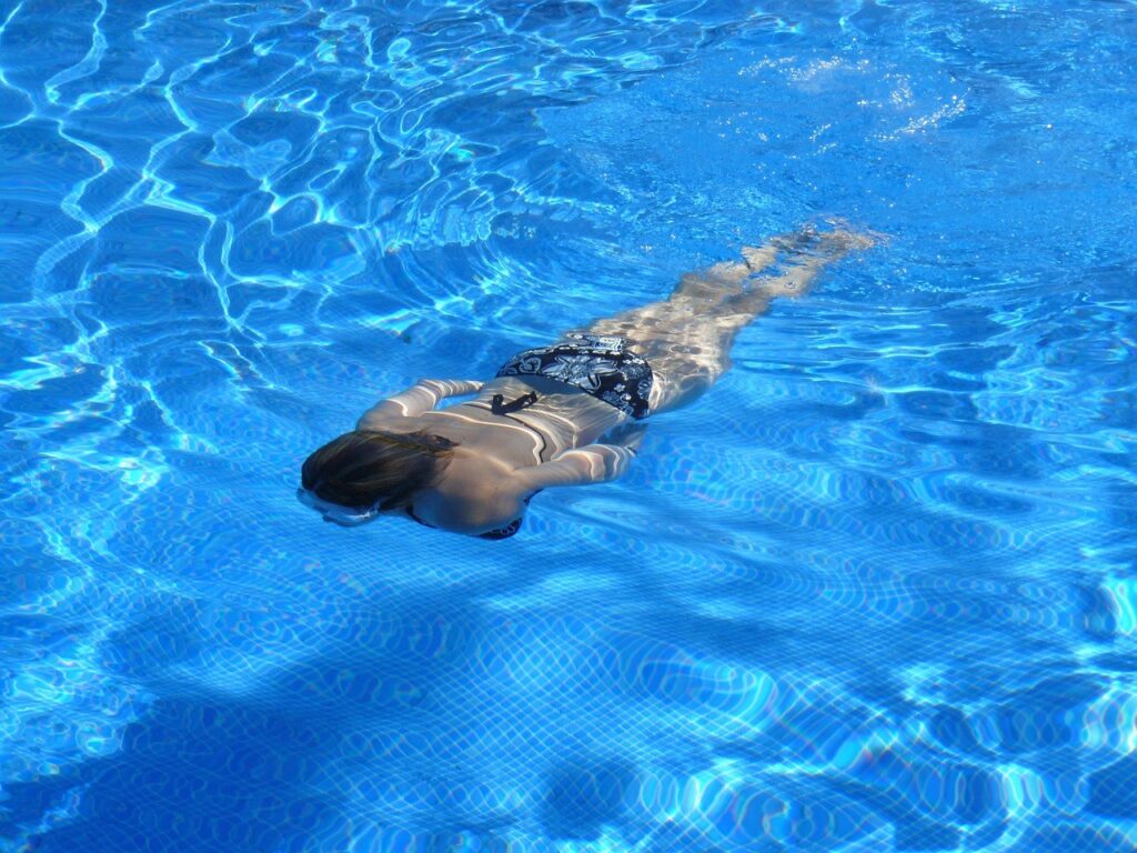 Try both swimming solo or with a squad
